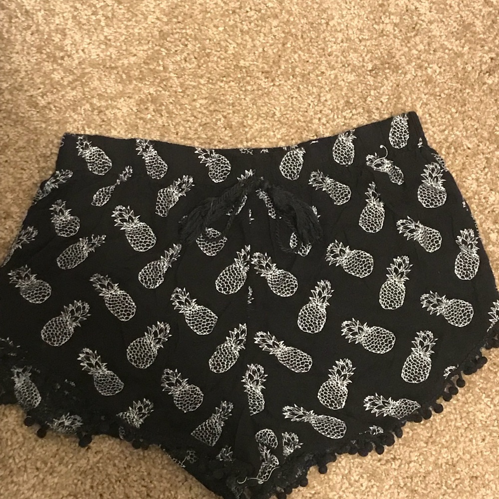 Black pineapple shorts